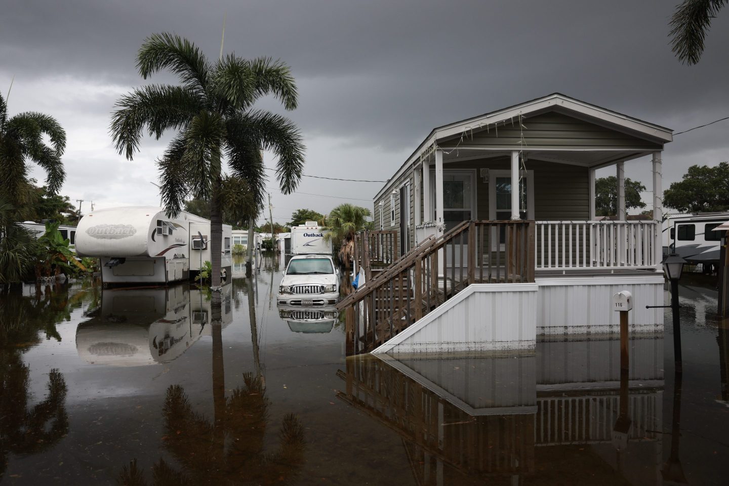 HALLANDALE BEACH, FLORIDA - JUNE 13: Flood waters surround homes on June 13, 2024, in Hallandale Beach, Florida. Tropical moisture passing through the area has caused flooding due to the heavy rain. (Photo by Joe Raedle/Getty Images)